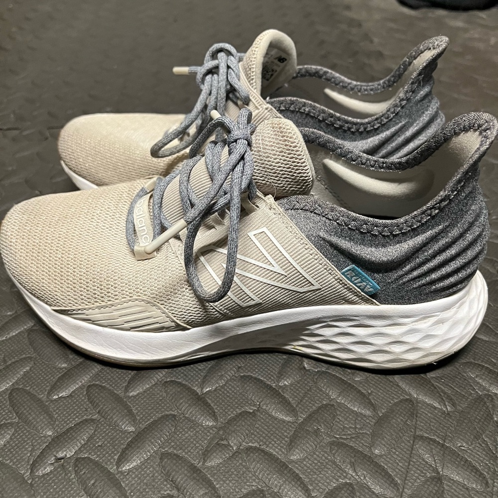 New Balance women’s Roav Cream and Gray Running Shoes